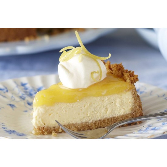 Lemon Cheesecake with One Slice being lifted 