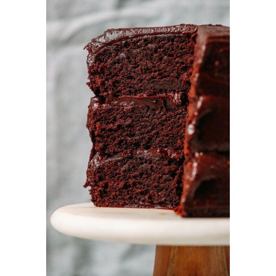 Round Chocolate Cake Standing On A Cake Stand