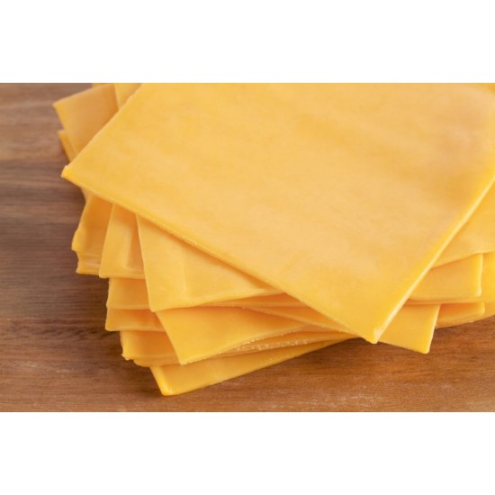 Sliced Red Cheddar on Chopping Board